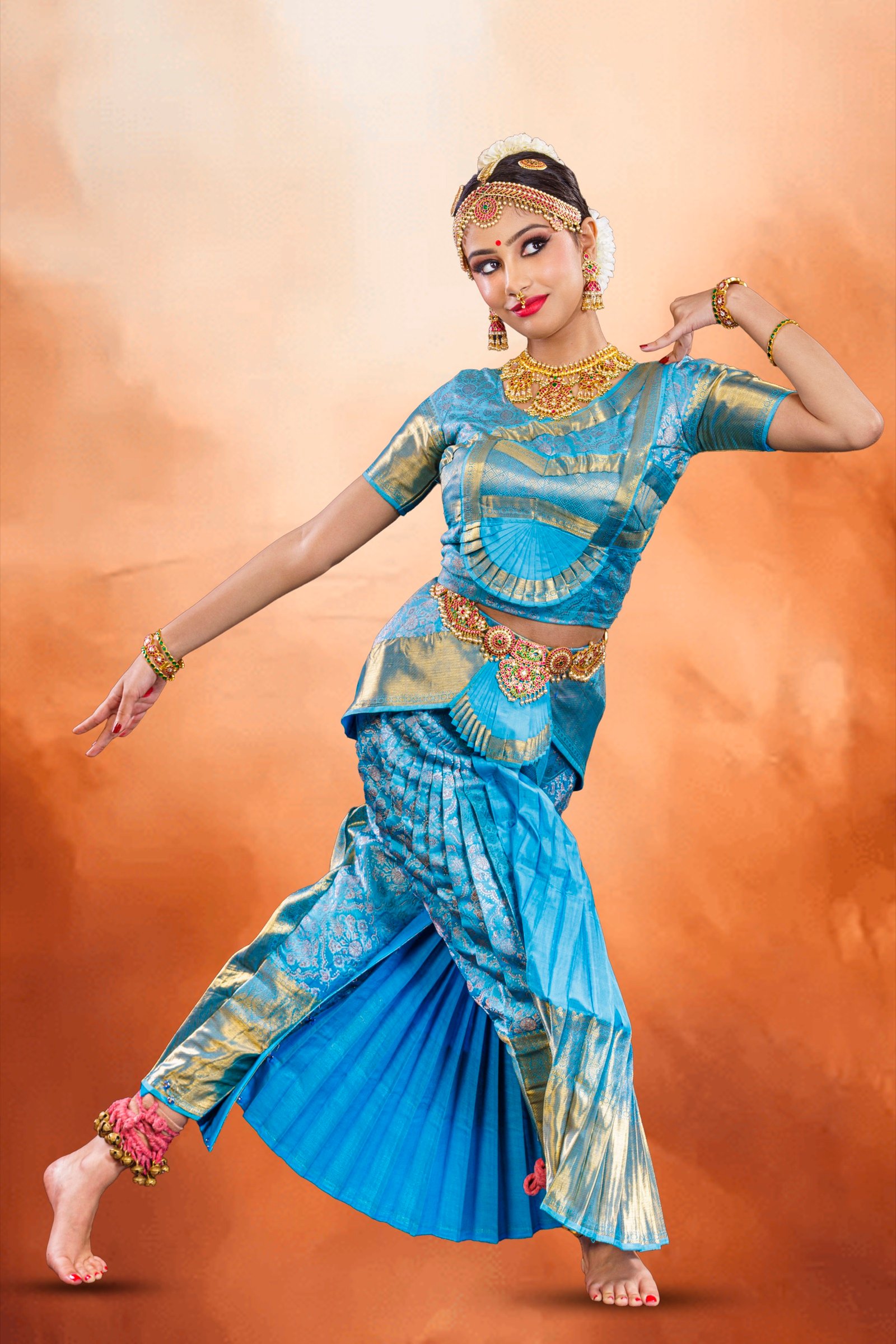 Ilesha mid-stride with skirt pleats sweeping